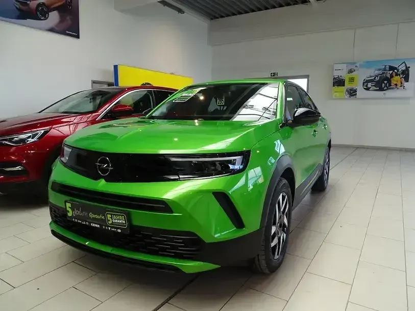Gebraucht Opel Mokka Elegance 101 PS (74 kW) 2024 Matcha green SUV