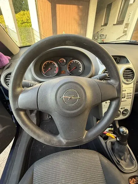 Gebraucht Opel Corsa Active 69 PS (50 kW) 2013 Blau Kleinwagen