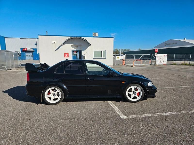 Gebraucht Mitsubishi Lancer 280 PS (205 kW) 2000 Schwarz Limousine