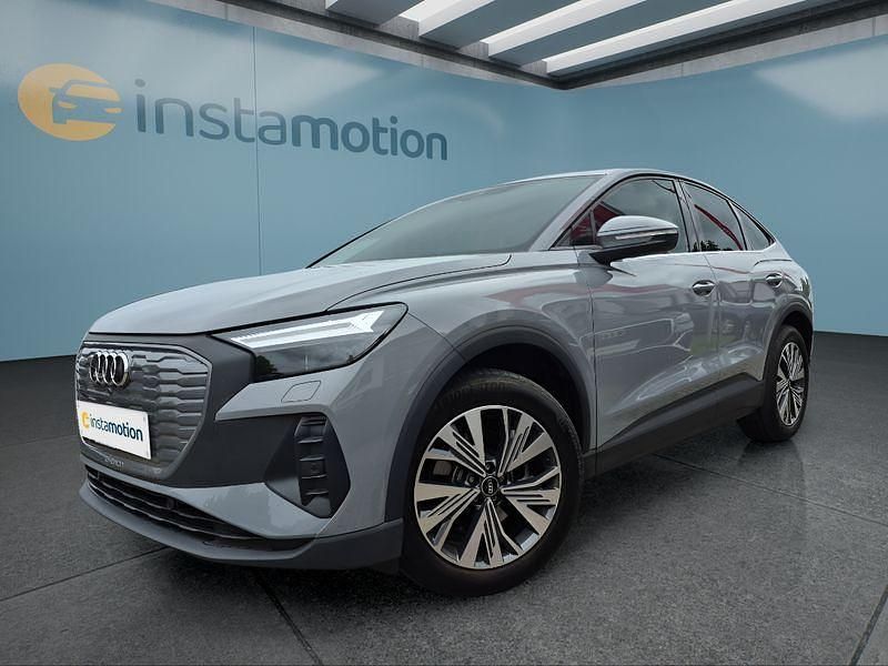 Grau Gebraucht 2022 Audi Q4 Sportback e-tron SUV | 29.449 € (Teuer) - Bild 1/4