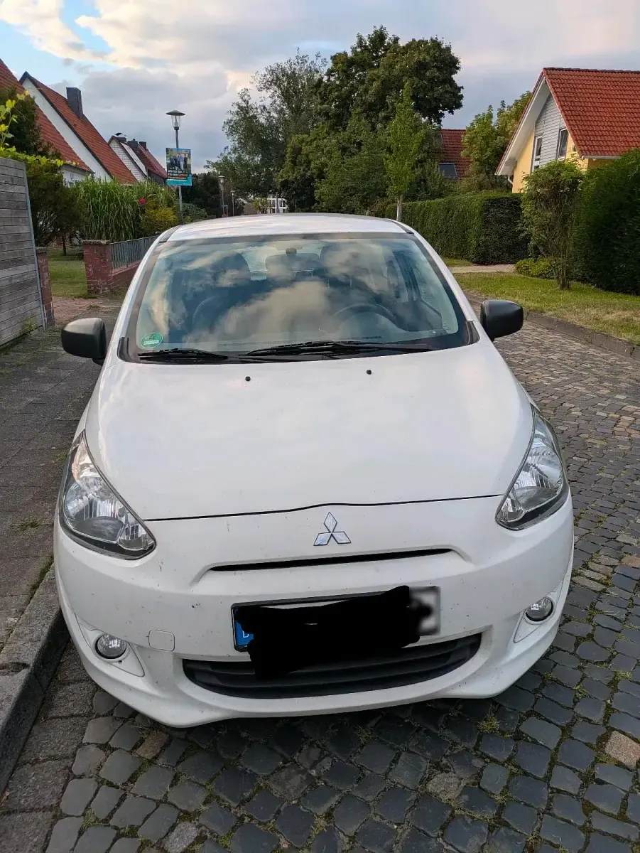 Gebraucht Mitsubishi Space Star 71 PS (52 kW) 2015 Weiß Kleinwagen