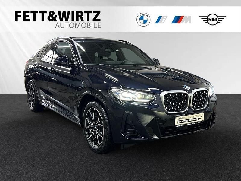 Carbonschwarz metallic Gebraucht 2024 BMW X4 M Sport SUV | 58.900 € (Guter Preis) - Bild 1/3