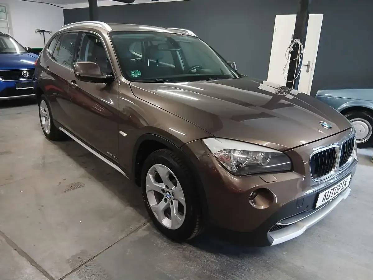 Gebraucht BMW X1 143 PS (105 kW) 2012 Sparkling bronze metallic SUV