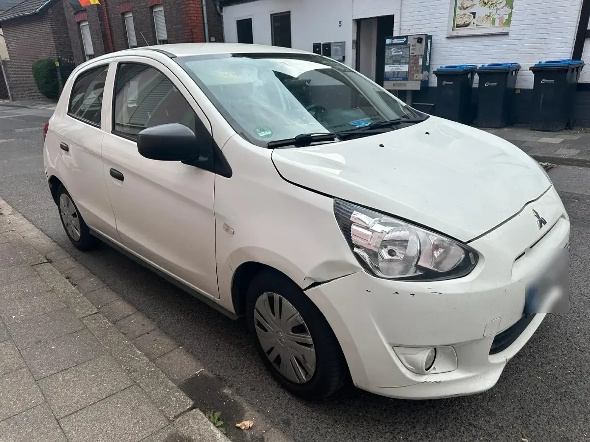 Gebraucht Mitsubishi Space Star 71 PS (52 kW) 2015 Weiß Kleinwagen