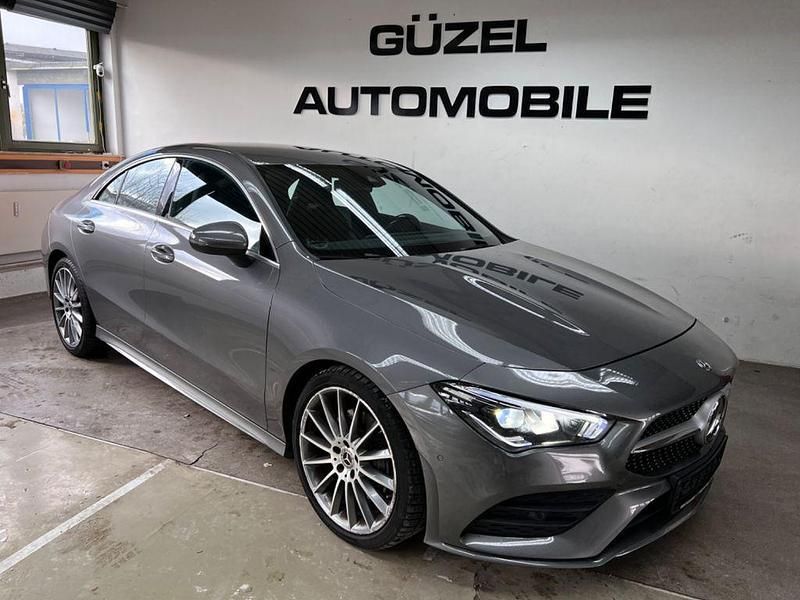 Grau Gebraucht 2020 Mercedes CLA200 AMG line Coupé | 28.990 € (Fairer Preis) - Bild 1/4