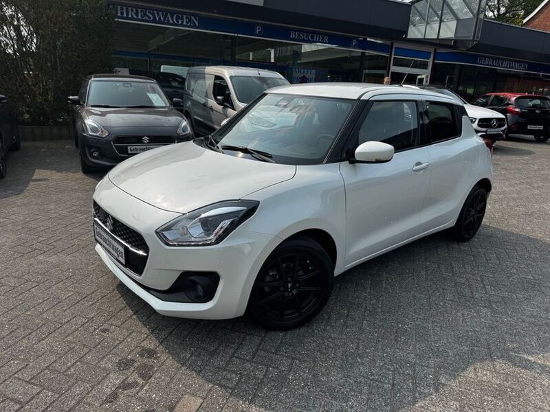Weiß Gebraucht 2018 Suzuki Swift Comfort+ Kleinwagen | 13.190 € (Fairer Preis) - Bild 1/4