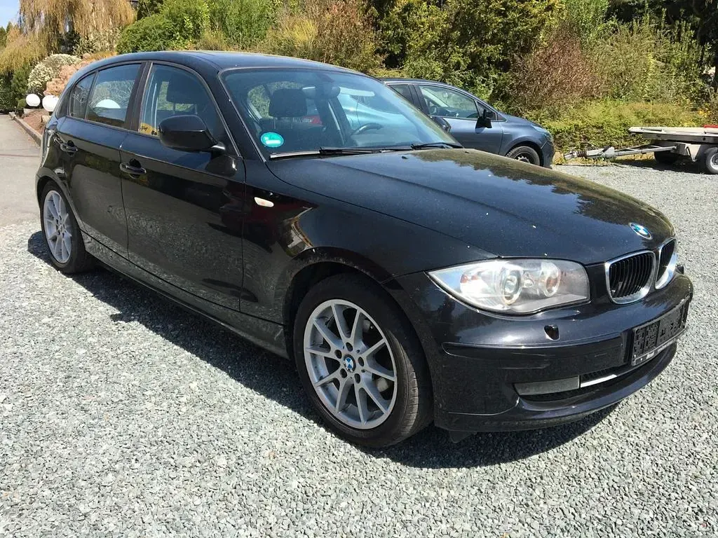 Second-hand BMW 116 122 CP (89 kW) 2009 Negru Hatchback