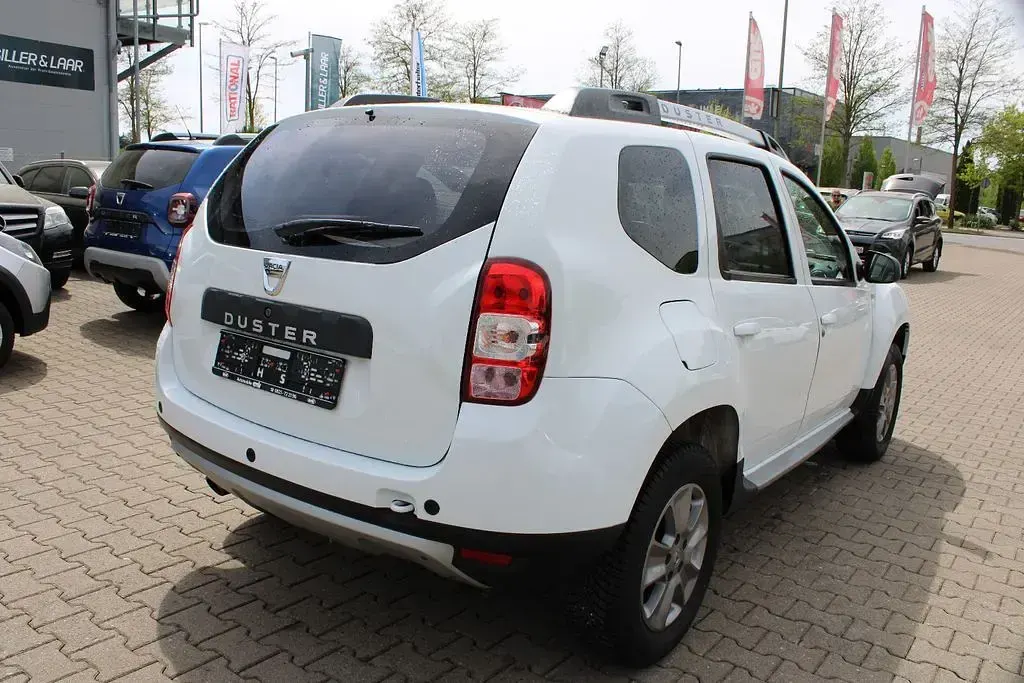 Używany Dacia Duster Prestige 125 KM (91 kW) 2016 Biały SUV