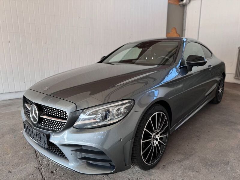 Selenitgrau metalliclack Gebraucht 2019 Mercedes C220 AMG Coupé | 26.990 € (Fairer Preis) - Bild 1/4