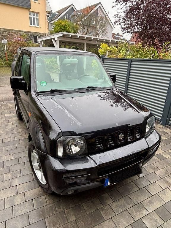 Schwarz Gebraucht 2009 Suzuki Jimny SUV | 8.249 € (Guter Preis) - Bild 1/4
