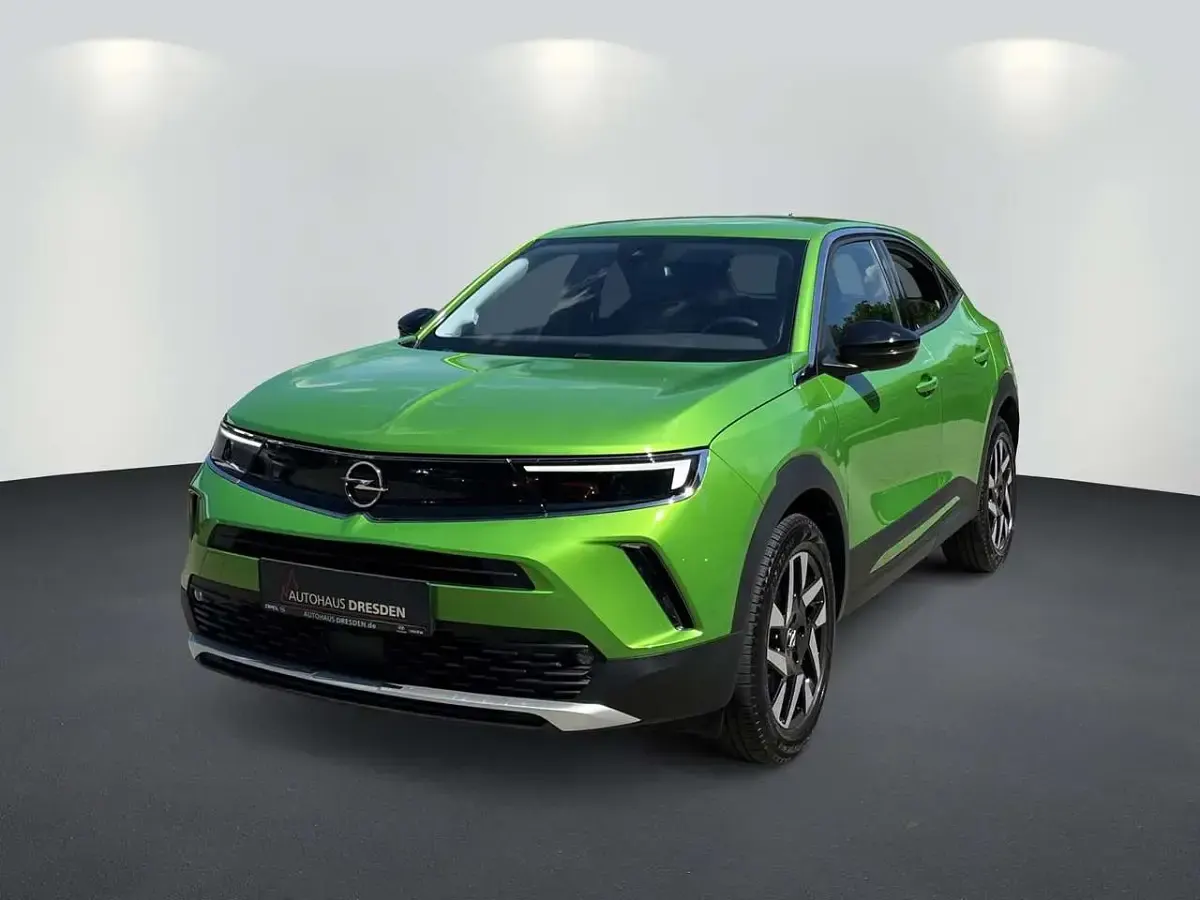 Gebraucht Opel Mokka-e Elegance 100 kW (136 PS) 2022 Matcha green (metallic) SUV