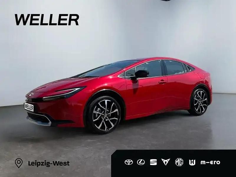 Karminarot metallic Neu 2025 Toyota Prius Executive Kleinwagen | 43.990 € (Fairer Preis) - Bild 1/3