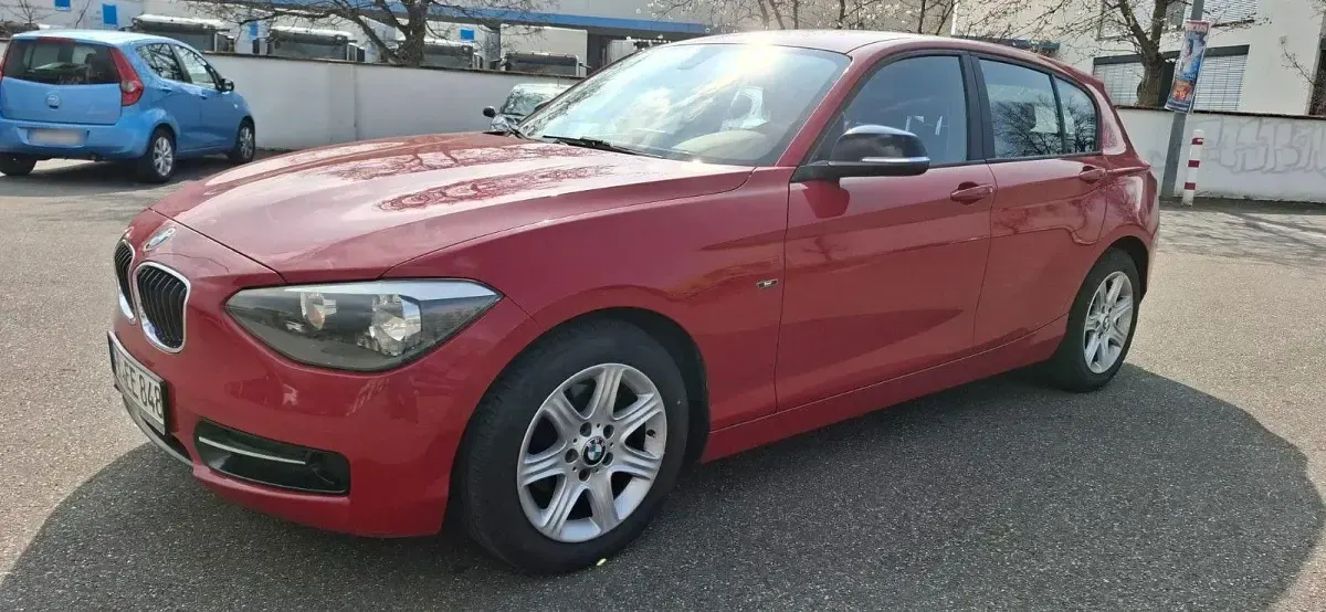 Gebraucht BMW 116 Sport Line 136 PS (100 kW) 2012 Rot Kleinwagen