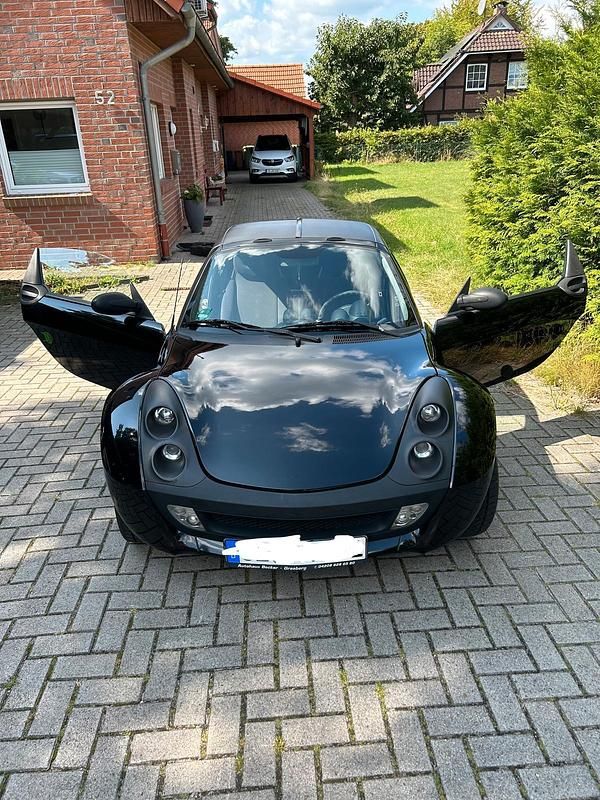 Schwarz Gebraucht 2003 Smart Roadster Cabrio | 4.150 € (Fairer Preis) - Bild 1/4