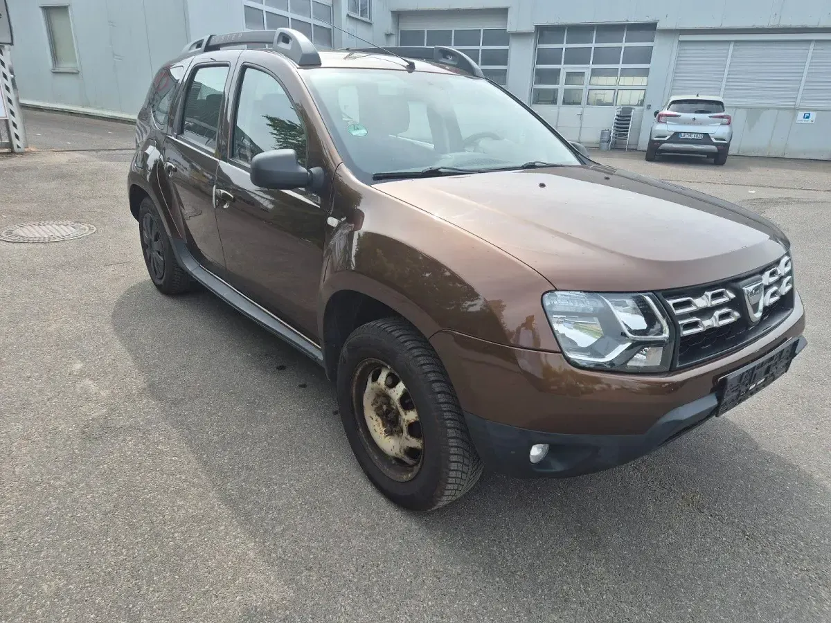 Używany Dacia Duster Lauréate 125 KM (91 kW) 2014 Żółty SUV