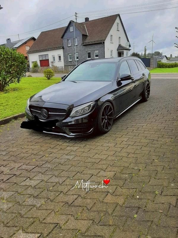 Schwarz Gebraucht 2015 Mercedes C400 AMG Kombi | 23.499 € - Bild 1/4