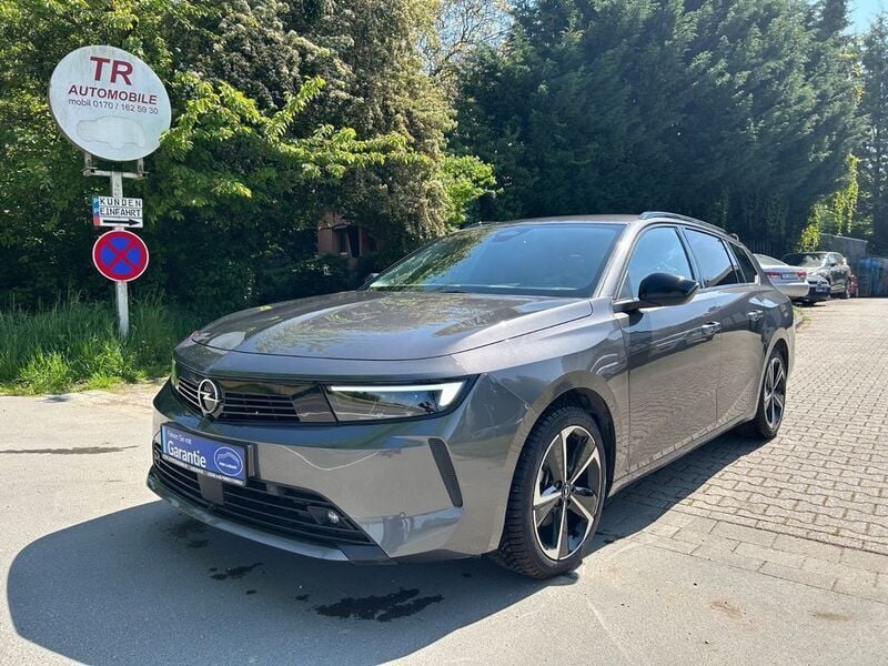 Grau/typ aussenverkleidung met Gebraucht 2024 Opel Astra Enjoy Kombi | 20.790 € (Superpreis) - Bild 1/4