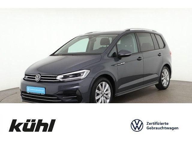 Delfingrau metallic Gebraucht 2025 VW Touran R-line Van / Kleinbus | 32.690 € (Guter Preis) - Bild 1/4