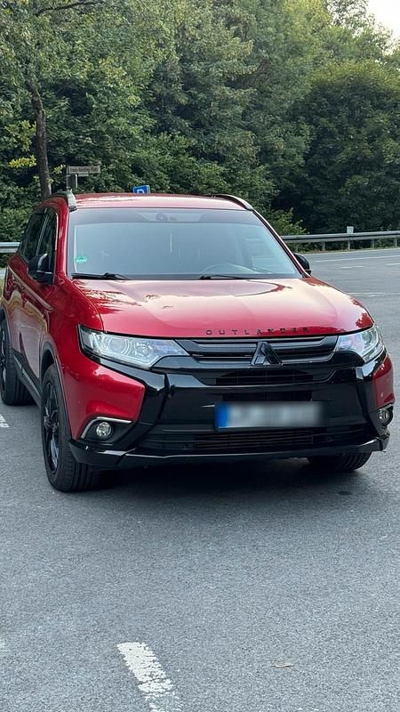 Rot Gebraucht 2015 Mitsubishi Outlander SUV | 12.950 € - Bild 1/4
