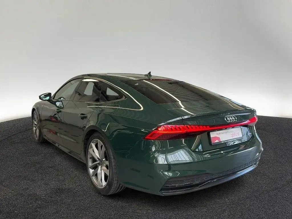 Gebraucht Audi A7 S-Line 367 PS (269 kW) 2023 Goodwoodgruen perl. Limousine