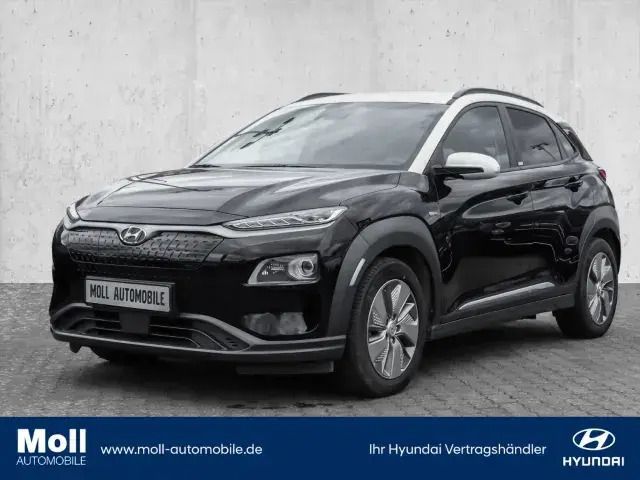 Phantom black / chalk white ro Gebraucht 2021 Hyundai Kona Premium SUV | 23.900 € (Fairer Preis) - Bild 1/4