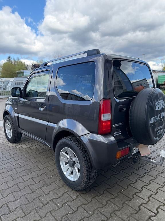 Second-hand Suzuki Jimny Style 86 CP (63 kW) 2012 Gri SUV