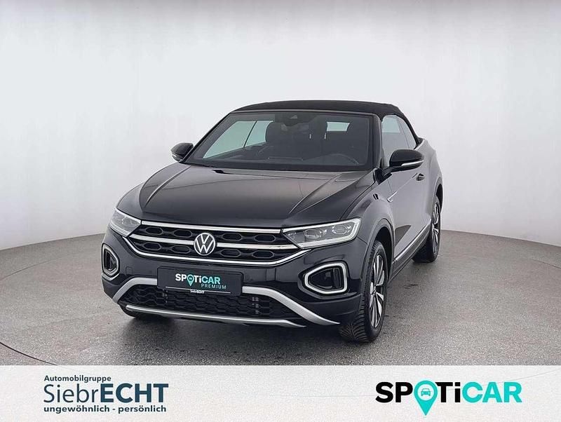 Schwarz (metallic) Gebraucht 2024 VW T-Roc Cabriolet Move Cabrio | 28.970 € (Superpreis) - Bild 1/4