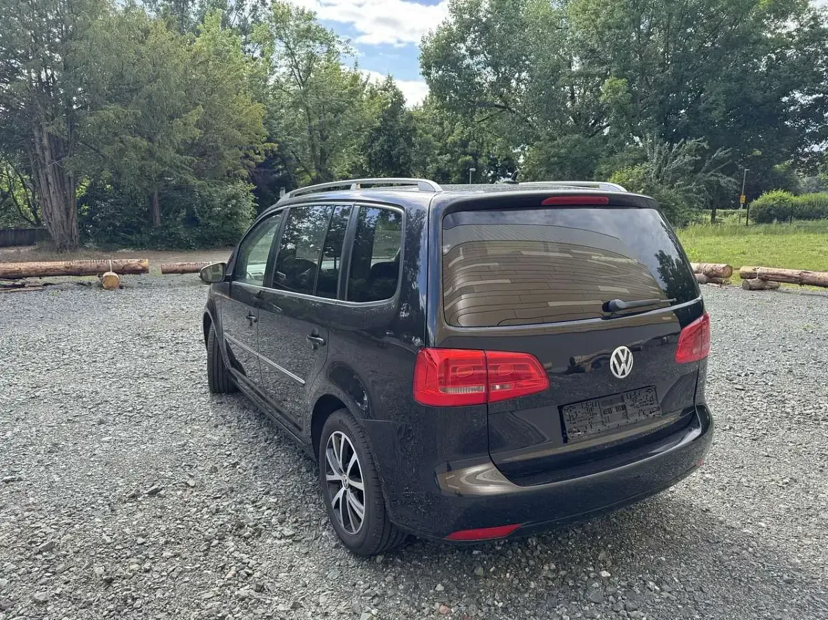Gebraucht VW Touran Highline 105 PS (77 kW) 2010 Schwarz Van / Kleinbus