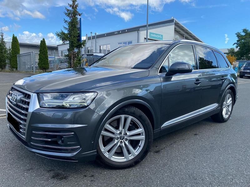 Grau Gebraucht 2017 Audi SQ7 Exclusive SUV | 24.950 € (Superpreis) - Bild 1/4