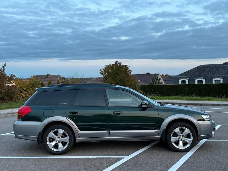 Grün Gebraucht 2004 Subaru Outback SUV | 6.900 € (Etwas zu teuer) - Bild 1/4