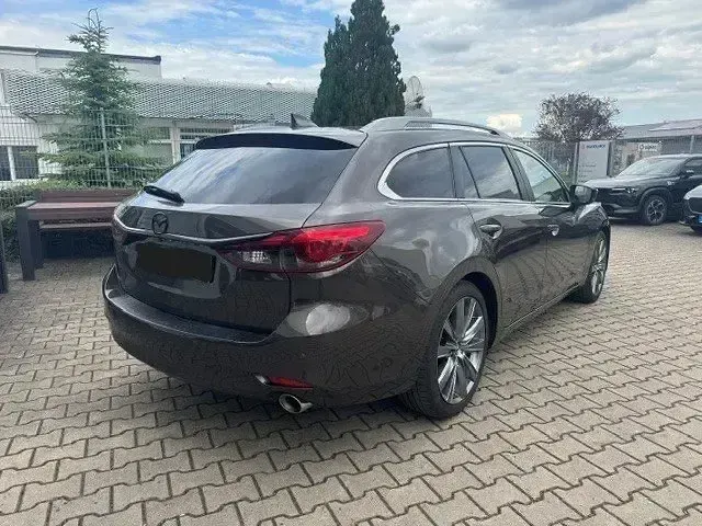 Gebraucht Mazda 6 Signature 194 PS (142 kW) 2018 Obsidiangrau metallic Kombi