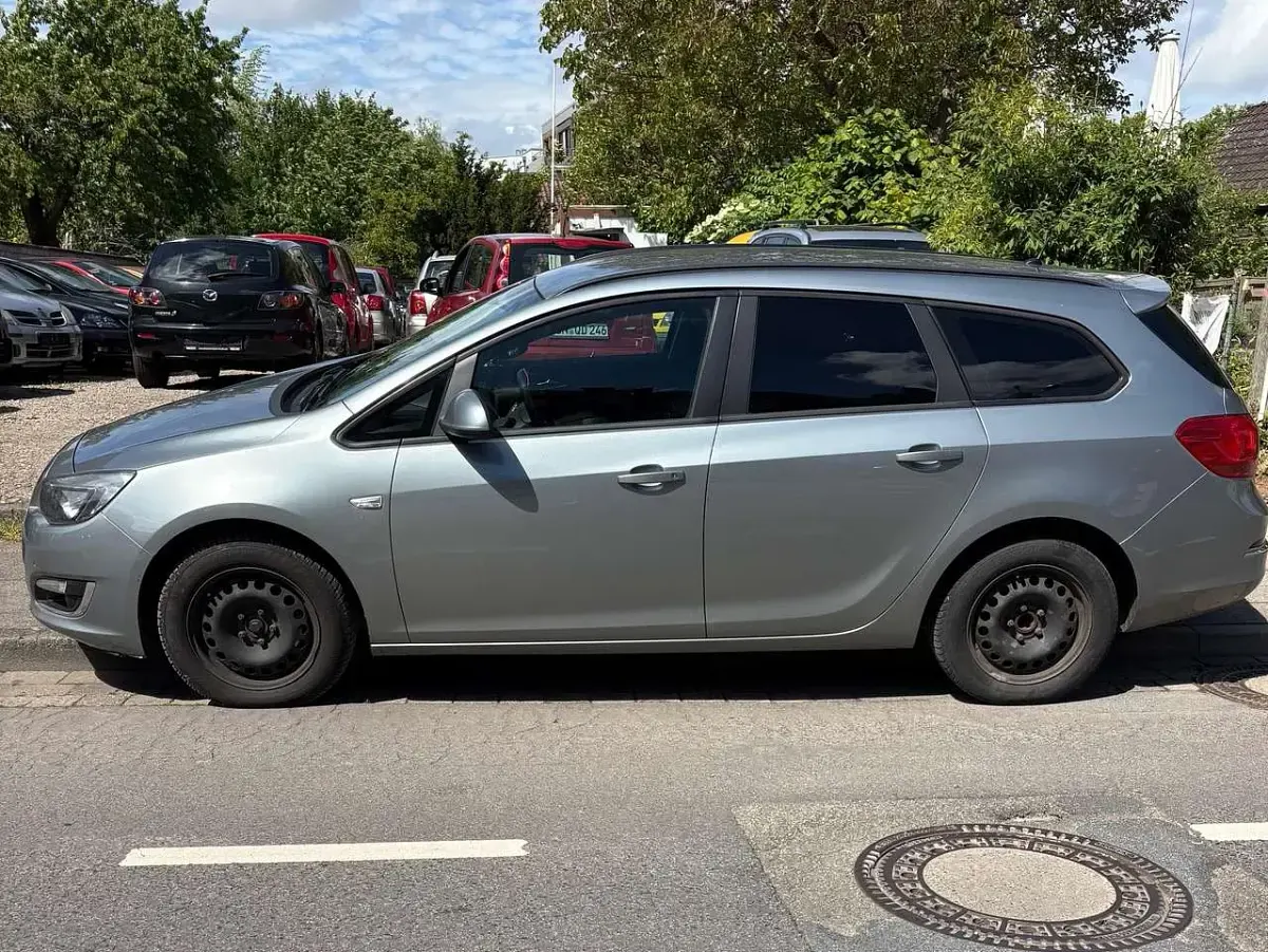 Gebraucht Opel Astra 110 PS (80 kW) 2013 Grün Kombi