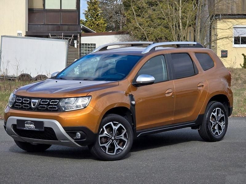 Używany Dacia Duster Prestige 125 KM (91 kW) 2018 Pomarańczowy SUV