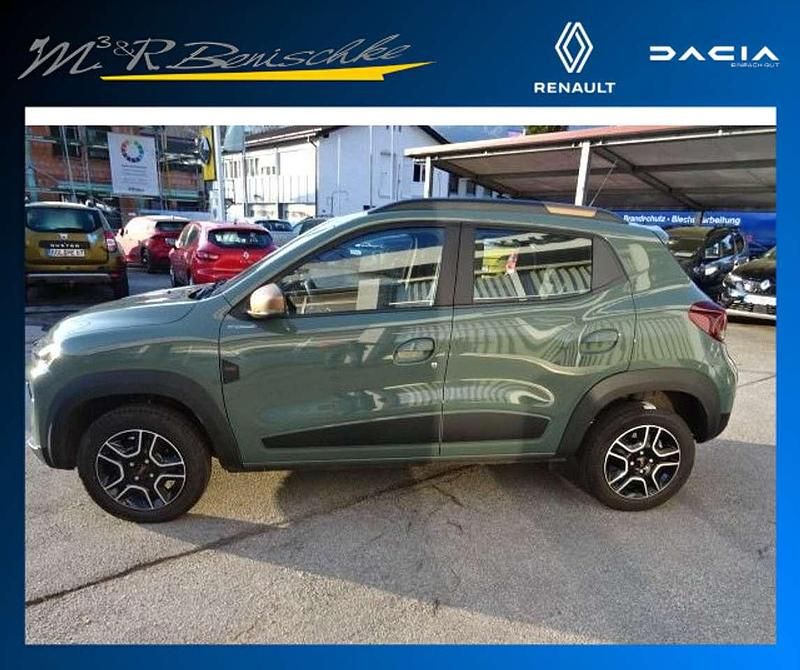 Gebraucht Dacia Spring Extreme 47 kW (65 PS) 2023 Olivgrün Kleinwagen