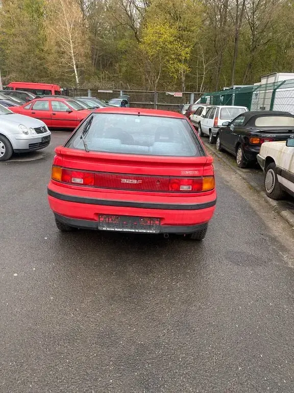 Gebraucht Mazda 323F 88 PS (64 kW) 1991 Rot Kleinwagen