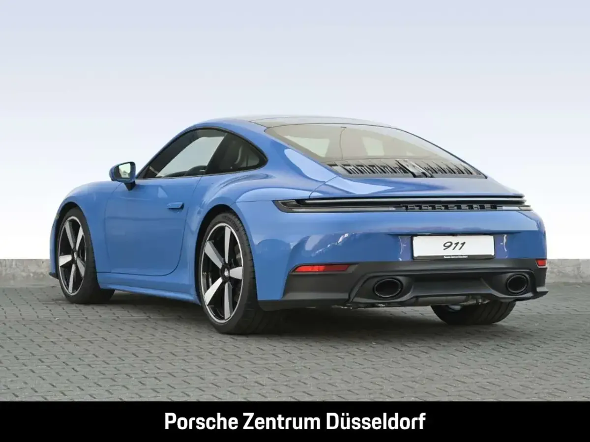 Gebraucht Porsche 911 Carrera 394 PS (289 kW) 2025 Luganoblau Coupé