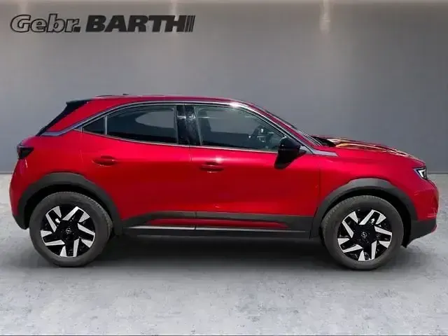 Używany Opel Mokka-e Elegance 100 kW (136 KM) 2024 Czerwony SUV