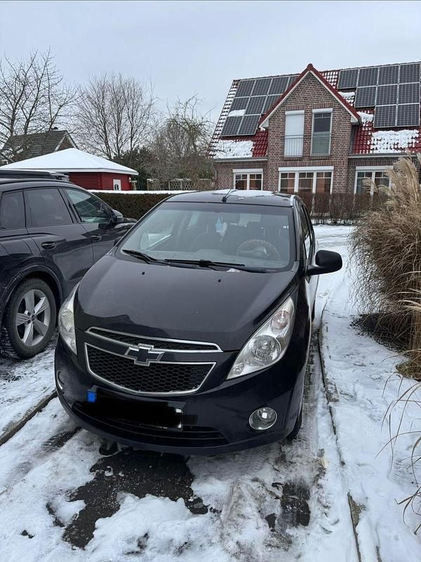 Schwarz Gebraucht 2011 Chevrolet Spark Kleinwagen | 2.290 € (Fairer Preis) - Bild 1/4
