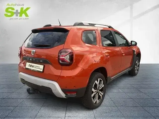 Używany Dacia Duster Prestige 101 KM (74 kW) 2022 Pomarańczowy SUV