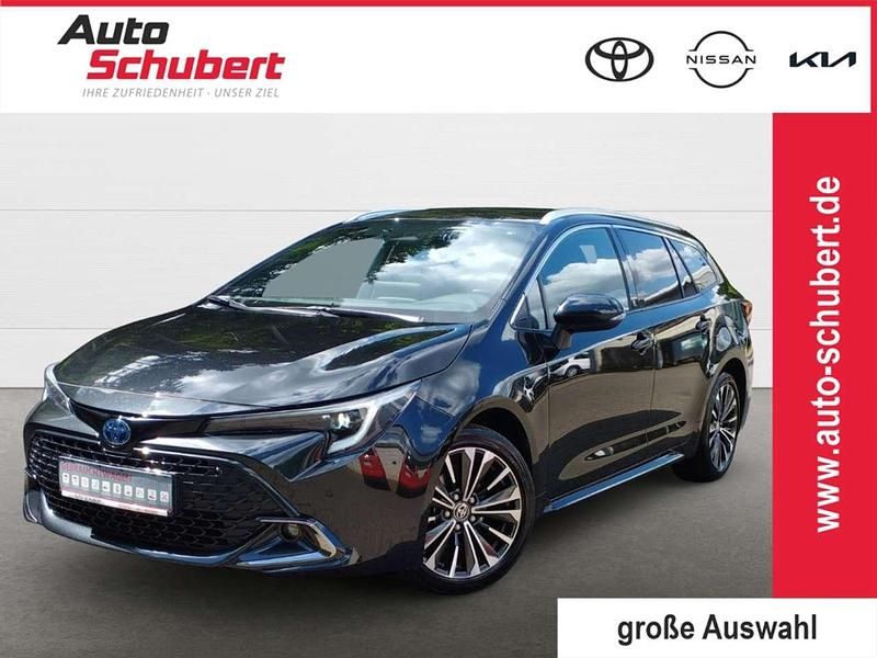 Black mica / ink Gebraucht 2024 Toyota Corolla Team Kombi | 26.880 € (Fairer Preis) - Bild 1/2