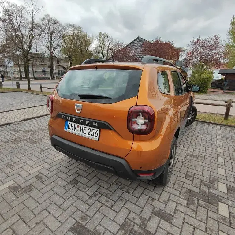 Używany Dacia Duster 101 KM (74 kW) 2020 Pomarańczowy SUV