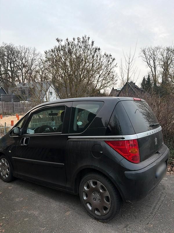 Gebraucht Peugeot 1007 75 PS (55 kW) 2009 Schwarz Van / Kleinbus