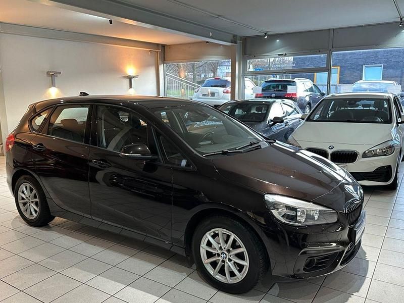 Braun Gebraucht 2014 BMW 218 Active Tourer Performance Van / Kleinbus | 10.599 € (Guter Preis) - Bild 1/4