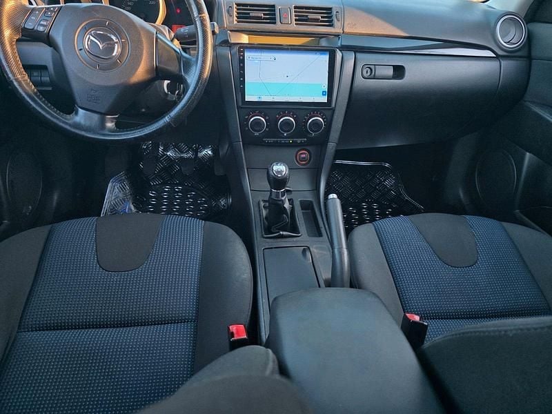 Second-hand Mazda 3 105 CP (77 kW) 2004 Argintiu Berlinǎ