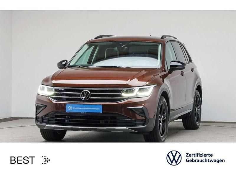 F1 ginger brown metallic (metallic) Gebraucht 2022 VW Tiguan Sportline SUV | 26.888 € (Fairer Preis) - Bild 1/3