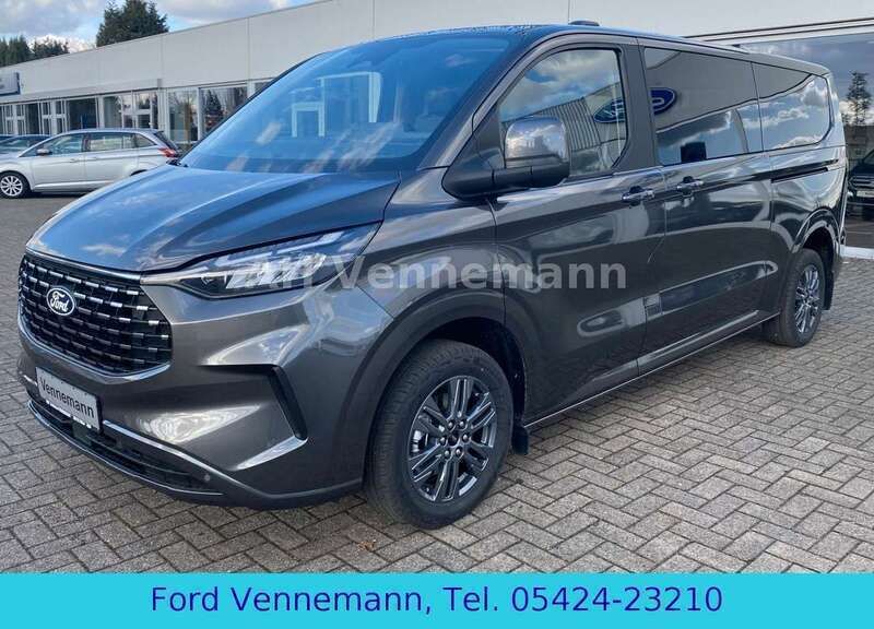 Grau Gebraucht 2024 Ford Tourneo Custom Titanium Van | 49.390 € (Teuer) - Bild 1/4