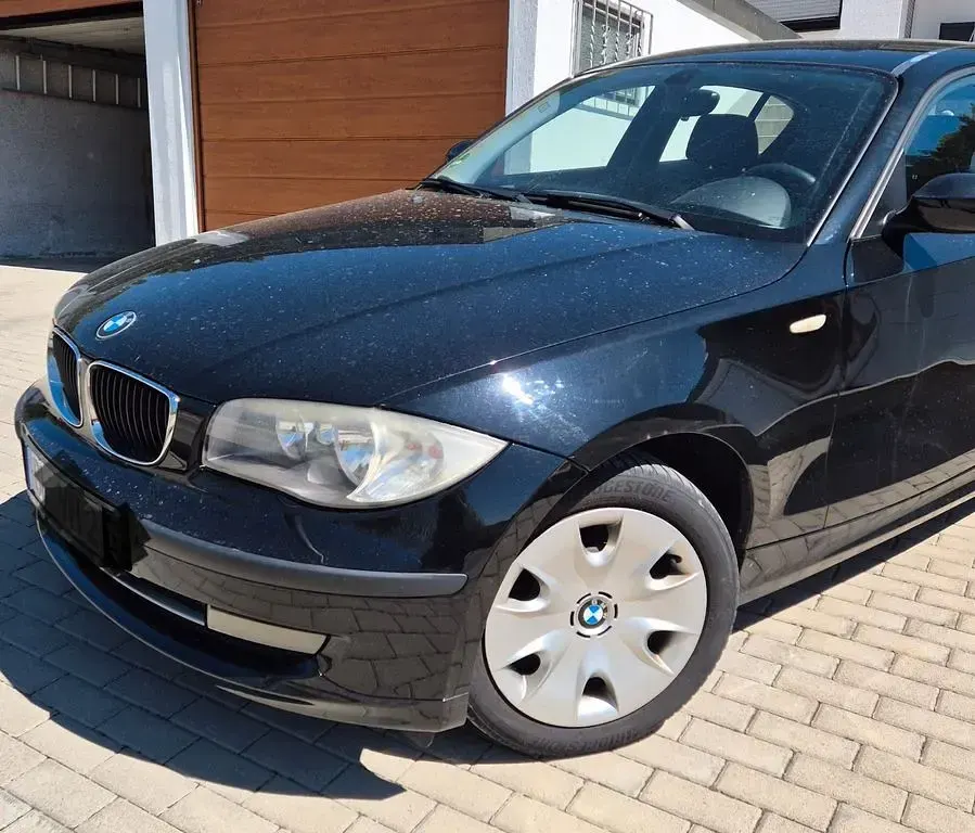 Second-hand BMW 116 122 CP (89 kW) 2009 Negru Hatchback