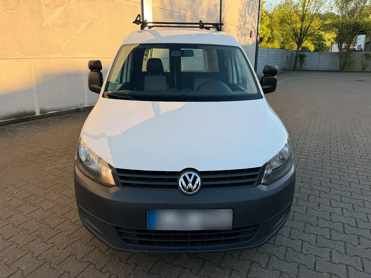 Używany VW Caddy 105 KM (77 kW) 2012 Biały Minivan