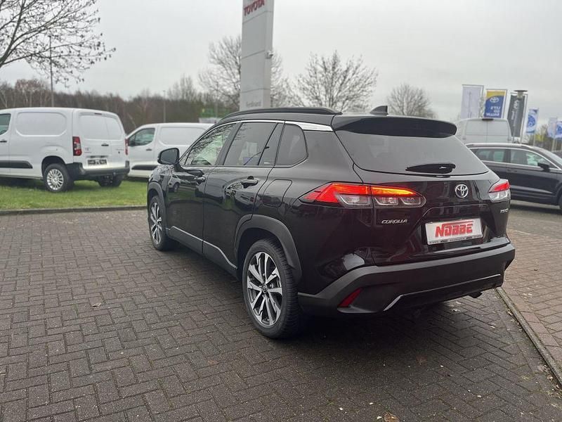 Gebraucht Toyota Corolla Cross Team 197 PS (144 kW) 2023 Tiefschwarz mica metallic SUV