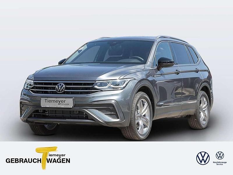 Grau Gebraucht 2023 VW Tiguan Allspace Move SUV | 31.460 € (Superpreis) - Bild 1/4